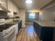 Modern kitchen featuring granite countertops and blue cabinets at 4626 Midridge Dr, Norcross, GA 30093