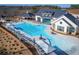 An aerial view showcasing the pool, community center, and other amenities at 4941 Adler Ct, Hoschton, GA 30548