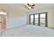 Spacious bedroom with three large windows at 4941 Adler Ct, Hoschton, GA 30548