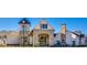 Community clubhouse featuring a mix of stone and siding, covered entry and manicured landscaping at 4941 Adler Ct, Hoschton, GA 30548