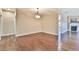 Bright and airy living room with hardwood floors and neutral paint at 4941 Adler Ct, Hoschton, GA 30548