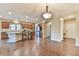 Open living room with hardwood floors and plenty of natural light at 4941 Adler Ct, Hoschton, GA 30548