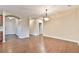 Dining room with beautiful floors and neutral paint at 4941 Adler Ct, Hoschton, GA 30548