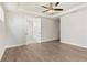 Main bedroom with hardwood floors and access to bathroom at 507 Pearl St, Cumming, GA 30040