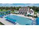 Resort-style pool with adjacent clubhouse at 507 Pearl St, Cumming, GA 30040