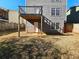 Home exterior showcasing deck and yard space at 1334 To Lani Farm Rd, Stone Mountain, GA 30083