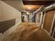 Unfinished basement with water heater and utilities at 1334 To Lani Farm Rd, Stone Mountain, GA 30083