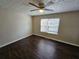 Bedroom with dark hardwood floors and a ceiling fan at 1334 To Lani Farm Rd, Stone Mountain, GA 30083