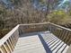Private deck overlooking a wooded area, ideal for outdoor relaxation at 1334 To Lani Farm Rd, Stone Mountain, GA 30083