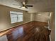 Open living room with hardwood floors and lots of natural light at 1334 To Lani Farm Rd, Stone Mountain, GA 30083