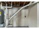 Unfinished basement corner with exposed pipes and wiring at 3426 Glensford Dr, Decatur, GA 30032