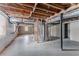Unfinished basement with exposed utilities and concrete floor at 3426 Glensford Dr, Decatur, GA 30032