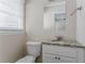 Small bathroom with granite countertop and white cabinet at 3426 Glensford Dr, Decatur, GA 30032