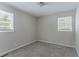 Simple bedroom with neutral walls and carpet flooring at 3426 Glensford Dr, Decatur, GA 30032