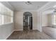 Dining area with hardwood floors and archway to kitchen at 3426 Glensford Dr, Decatur, GA 30032
