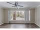 Spacious living room with large window and hardwood floors at 3426 Glensford Dr, Decatur, GA 30032