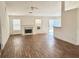 Spacious living room featuring hardwood floors and a fireplace at 3960 Brushy Wood Dr, Loganville, GA 30052