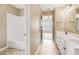 Clean bathroom with shower/tub combo and double vanity at 9706 Spyglass Dr, Villa Rica, GA 30180