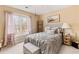 Charming bedroom with large window, bedding and decor at 9706 Spyglass Dr, Villa Rica, GA 30180