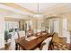 Formal dining room with hardwood floors and access to kitchen at 9706 Spyglass Dr, Villa Rica, GA 30180