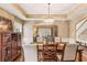Open dining room with hardwood floors and view into Gathering room at 9706 Spyglass Dr, Villa Rica, GA 30180