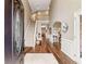 Two-story foyer with hardwood floors and elegant staircase at 9706 Spyglass Dr, Villa Rica, GA 30180