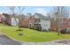 Two-story house on a corner lot with a manicured lawn at 9706 Spyglass Dr, Villa Rica, GA 30180