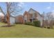 Brick two-story house with gray accents and landscaped lawn at 9706 Spyglass Dr, Villa Rica, GA 30180