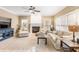 Gathering room boasts a fireplace, large windows, and comfortable seating at 9706 Spyglass Dr, Villa Rica, GA 30180