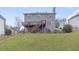 Two-story house with large backyard, deck, and attached stairs at 9706 Spyglass Dr, Villa Rica, GA 30180