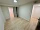 Simple and bright basement bedroom with wood flooring at 2371 Cresta Dr, Decatur, GA 30032