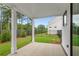 Spacious covered patio overlooking fenced backyard at 515 Pearl St, Cumming, GA 30040