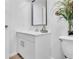 Simple bathroom with white vanity and toilet at 346 Carpenter Dr # 51, Atlanta, GA 30328