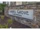Community entrance sign for Laurel Grove Condominiums at 346 Carpenter Dr # 51, Atlanta, GA 30328