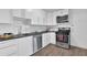 Modern kitchen with stainless steel appliances and white cabinets at 346 Carpenter Dr # 51, Atlanta, GA 30328