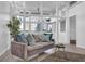 Cozy living room with gray sofa and large windows at 346 Carpenter Dr # 51, Atlanta, GA 30328
