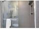 Clean shower with gray tile and double shower heads at 346 Carpenter Dr # 51, Atlanta, GA 30328