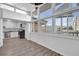 Sunroom with wall of windows offering scenic views at 346 Carpenter Dr # 51, Atlanta, GA 30328