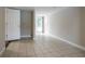 Finished basement area with tile floors and exterior access at 3211 Sandusky Dr, Decatur, GA 30032
