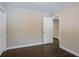 Well-lit bedroom featuring hardwood floors and neutral wall tones at 3211 Sandusky Dr, Decatur, GA 30032