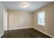 Bright bedroom with hardwood floors and window at 3211 Sandusky Dr, Decatur, GA 30032