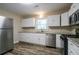 Updated kitchen with stainless steel appliances at 3211 Sandusky Dr, Decatur, GA 30032