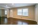 Bright living room with hardwood floors, neutral walls, and ample natural light at 3211 Sandusky Dr, Decatur, GA 30032