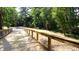 Scenic walking trail through a wooded area at 325 Silver Moon Dr, Loganville, GA 30052