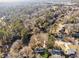Wide aerial view of the neighborhood, showing surrounding houses and landscape at 3048 Charlbury Pl, Avondale Estates, GA 30002