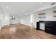 Finished basement with hardwood floors and built-in shelving at 3048 Charlbury Pl, Avondale Estates, GA 30002