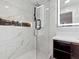 Spa-like bathroom with marble tile and a glass shower at 3048 Charlbury Pl, Avondale Estates, GA 30002