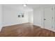 Well-lit bedroom with hardwood floors and a closet at 3048 Charlbury Pl, Avondale Estates, GA 30002