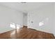 Spacious bedroom with hardwood floors and ample natural light at 3048 Charlbury Pl, Avondale Estates, GA 30002