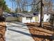 Ranch style home with carport, and newly landscaped yard at 3048 Charlbury Pl, Avondale Estates, GA 30002